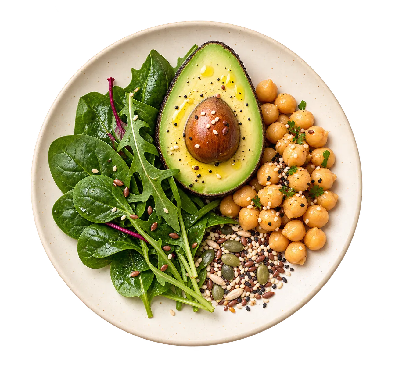 Plato vegano con aguacate, garbanzos, hojas verdes y semillas
